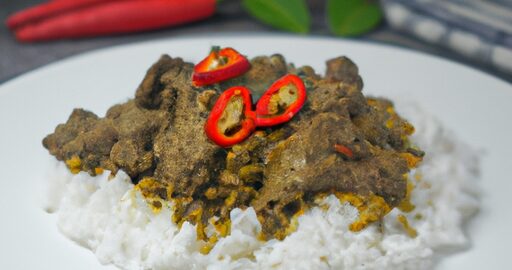 Kuřecí rendang s rýží.
