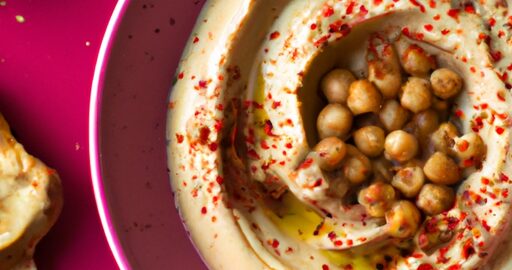 Hummus s tahini a granátovými semínky.